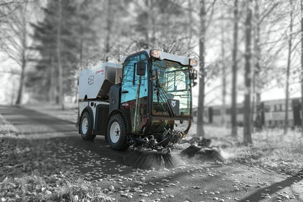 Multihog CV sweeper clearing leaves